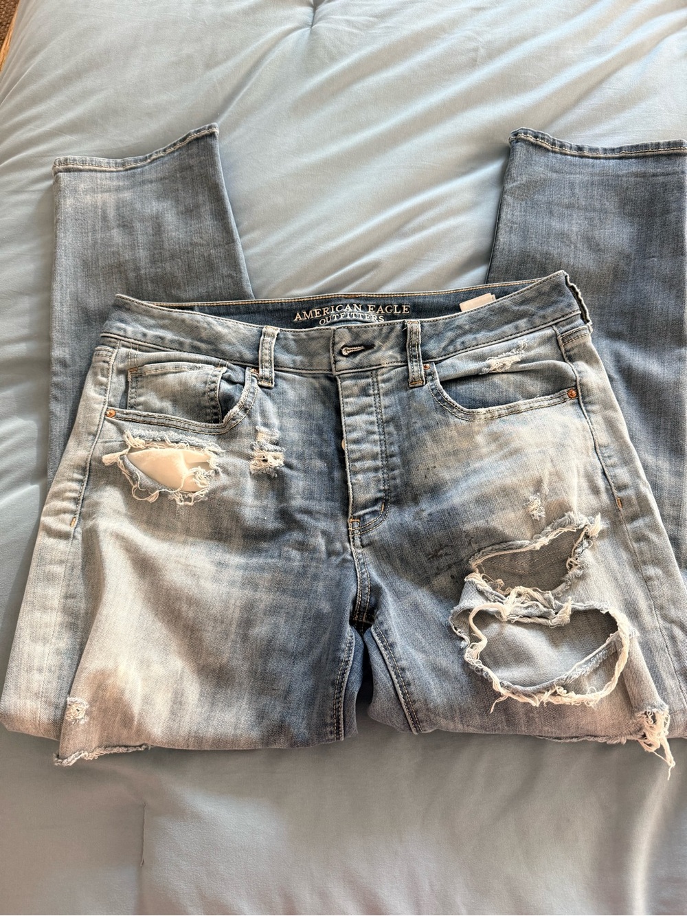 American Eagle Outfitters Faded Light Blue Distressed Slim Straight Jeans